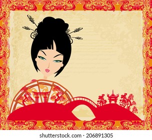 attractive asian woman holding traditional fan 