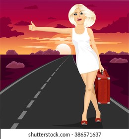 attractive blonde standing with suitcase voting on road