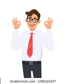 Attractive cheerful young business man showing/gesturing/making okay or ok sign, while winking eye. Human emotions, facial expressions, feelings concept illustration in vector cartoon style.