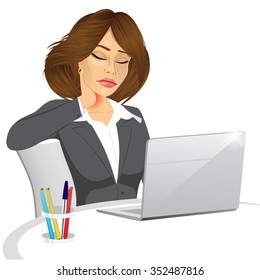 attractive female office worker suffering neck pain while working on her laptop computer 