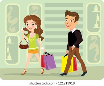 Attractive happy young couple shopping.