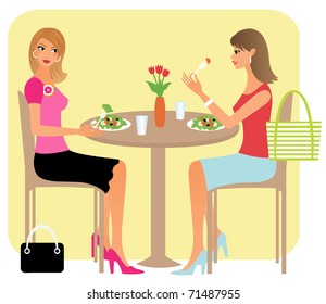 Attractive woman having a lunch with her girlfriend