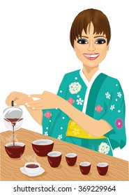 attractive woman in kimono pouring tea