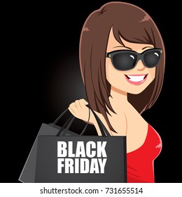 Attractive woman with sunglasses holding black bags with Black Friday text on dark background