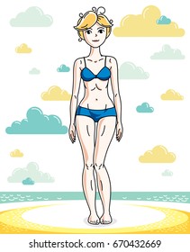 Attractive young blonde woman standing on tropical beach and wearing blue bathing suit. Vector human illustration. Summer vacation theme.
