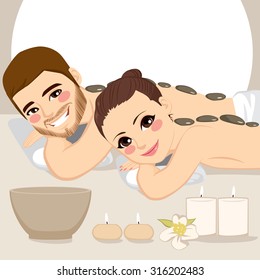 Attractive young couple on a spa enjoying hot stone massage treatment