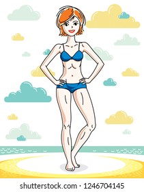Attractive young redhead woman standing on tropical beach and wearing blue bathing suit. Vector human illustration. Summer vacation theme.
