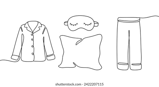 Attributes of a comfortable sleep: pajamas, a sleep mask and a soft pillow. World Sleep Day. Images produced without the use of any form of AI software at any stage. 