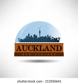 Auckland, New Zealand, city skyline silhouette in snow globe. Vector design.