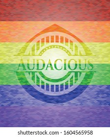 Audacious emblem on mosaic background with the colors of the LGBT flag