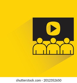 audiences and video on screen icon on yellow background