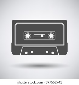 Audio cassette  icon on gray background with round shadow. Vector illustration.