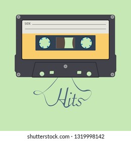 Audio cassette tape. "Hits" inspirational lettering. Old vintage audio cassette