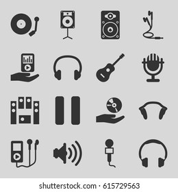 Audio icons set. set of 16 audio filled icons such as microphone, loud speaker set, pause, loudspeaker, guitar, mp3 player on hand, earphones, CD on hand, gramophone, volume