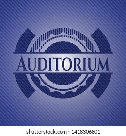 Auditorium badge with denim texture. Vector Illustration. Detailed.