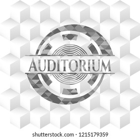 Auditorium grey badge with geometric cube white background