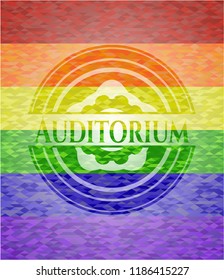 Auditorium on mosaic background with the colors of the LGBT flag