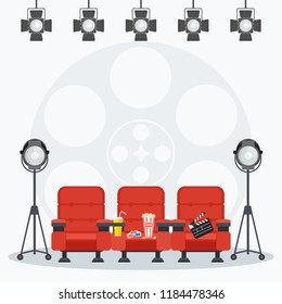 Auditorium and red comfortable armchairs in the cinema under spotlight. Drinks and popcorn, glasses for movie Flat vector cartoon illustration. Objects isolated on a white background.