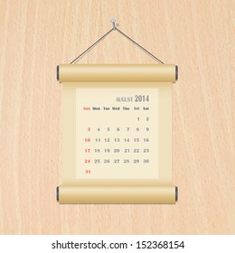 August 2014 calendar on wood wall