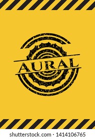 Aural black grunge emblem with yellow background. Vector Illustration. Detailed.