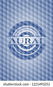 Aural blue badge with geometric background.