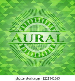 Aural realistic green emblem. Mosaic background