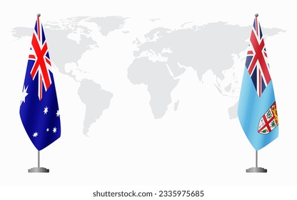 Australia and Fiji flags for official meeting against background of world map.