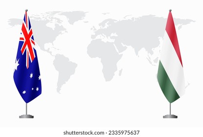 Australia and Hungary flags for official meeting against background of world map.