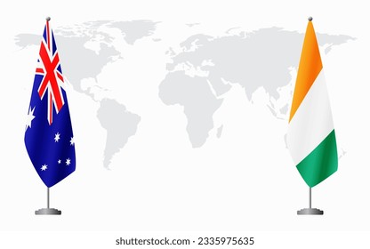 Australia and Ivory Coast flags for official meeting against background of world map.