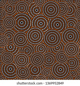 Australian aboriginal art seamless vector pattern with white and orange dotted circles on black background