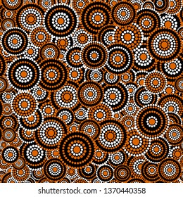 Australian aboriginal art seamless vector pattern with white and orange dotted circles on black background