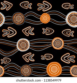Australian aboriginal seamless vector pattern with white and orange dotted circles, rings, boomerangs and wavy stripes on black background