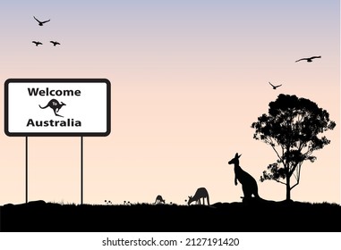 Australian scene with sign of welcome to australia. Kangaroos and gum trees