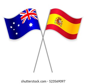 Australian and Spanish crossed flags. Australia combined with Spain isolated on white. Language learning, international business or travel concept.