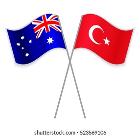 Australian and Turkish crossed flags. Australia combined with Turkey isolated on white. Language learning, international business or travel concept.