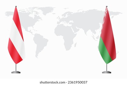 Austria and Belarusian flags for official meeting against background of world map.