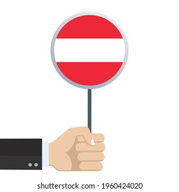 Austria circular flag. Hand holding round Austrian flag. National symbol. Vector illustration. 