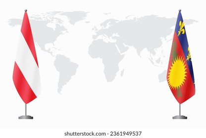 Austria and Guadeloupe flags for official meeting against background of world map.