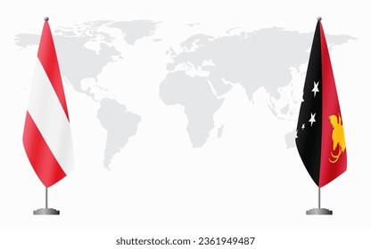 Austria and Papua New Guinea flags for official meeting against background of world map.