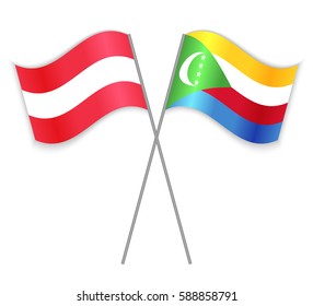 Austrian and Comoran crossed flags. Austria combined with Comoros isolated on white. Language learning, international business or travel concept.