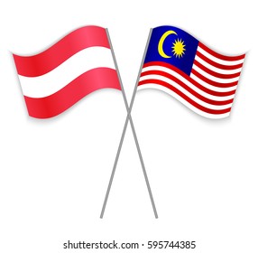 Austrian and Malaysian crossed flags. Austria combined with Malaysia isolated on white. Language learning, international business or travel concept.