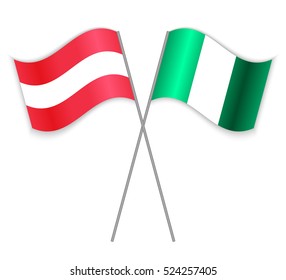 Austrian and Nigerian crossed flags. Austria combined with Nigeria isolated on white. Language learning, international business or travel concept.