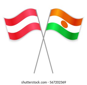 Austrian and Nigerien crossed flags. Austria combined with Niger isolated on white. Language learning, international business or travel concept.