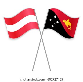 Austrian and Papuan crossed flags. Austria combined with Papua New Guinea isolated on white. Language learning, international business or travel concept.