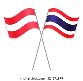 Austrian and Thai crossed flags. Austria combined with Thailand isolated on white. Language learning, international business or travel concept.