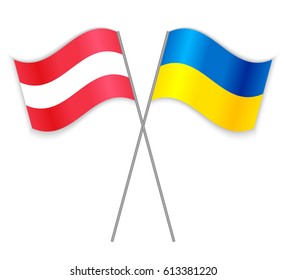 Austrian and Ukrainian crossed flags. Austria combined with Ukraine isolated on white. Language learning, international business or travel concept.