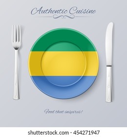 Authentic Cuisine of Gabon. Plate with Gabonese Flag and Cutlery