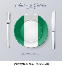 Authentic Cuisine of Nigeria. Plate with Nigerian Flag and Cutlery