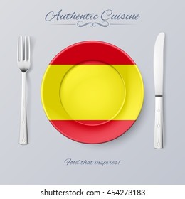 Authentic Cuisine of Spain. Plate with Spanish Flag and Cutlery