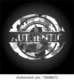 Authentic written on a grey camouflage texture
